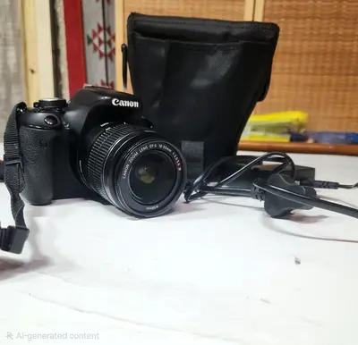 Canon EOS 600D DSLR with 18-55mm kit lens(with lens cover), bag, charger and 16 GB SD card