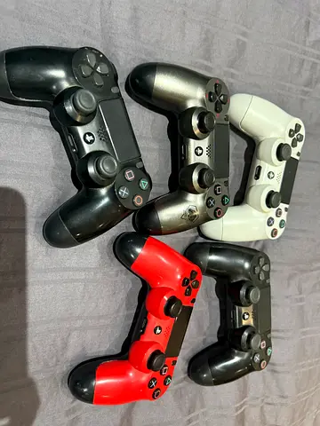 Set of 5 PS4 DualShock 4 Controllers — Mixed Colors, Used including MGS limited edition