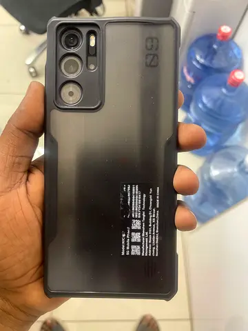 Used Android smartphone with protective case - good condition