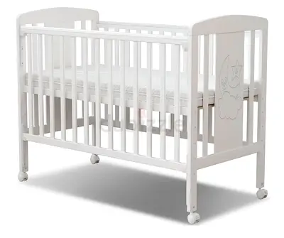 Juniors White wooden baby crib with mattress and wheels in best condition (hardly used)
