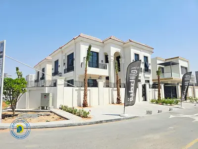Luxury corner villa in Al Yasmin, 5 bedrooms and swimming pool, strategic location