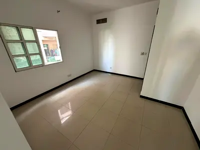One bedroom and living room apartment in Al Rashidiya area, next to Nesto Market and near Al Mina Street, at a special price of 27,000.