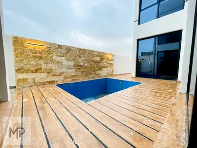 Villa for sale, including registration and ownership fees, at an attractive price, right next to services and the mall. Freehold ownership for all nat