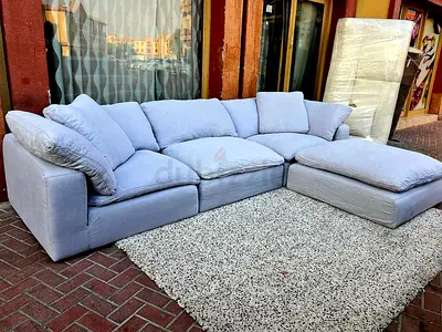 Marina home Luscious feather filled modular sofa with footstool