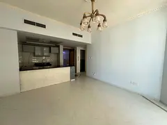 Elegant 1-bedroom apartment with a living room and American kitchen in Al Majaz 3, with free AC, gym