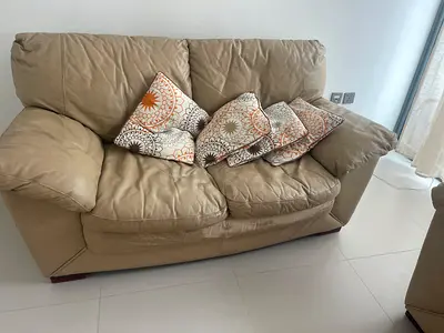 Beige leather 2-seater sofa (loveseat), used - two pieces