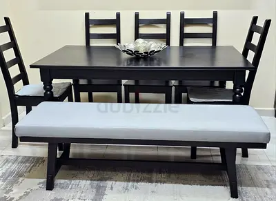 IKEA Extendable dining table with 6 chairs and bench. Like new