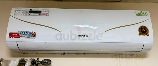 Used wall-mounted split air conditioner (working)
