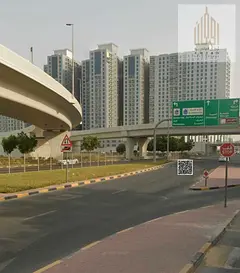 Residential/Commercial Land for Sale in Al Rashidiya 3, Ajman, on Three Streets and a Prime Investme