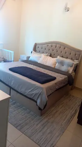 Upholstered bed 200cm by 200cm king size with tufted headboard — great condition