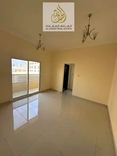 A modern apartment is available for annual rent in Al Rawda 1, Ajman, located in a prime and vibrant