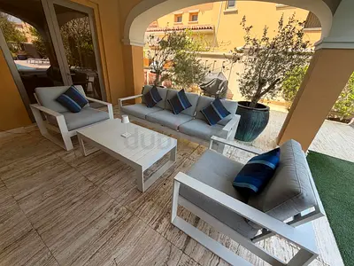 Outdoor patio sofa set — 3-seater + 2 armchairs + coffee table. Recently recovered.