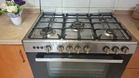 My stainless steel gas range with oven - working condition