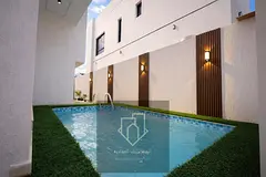 villas pool with 5 large bedrooms, master suite, majlis, living room, kitchen, and maid's room w