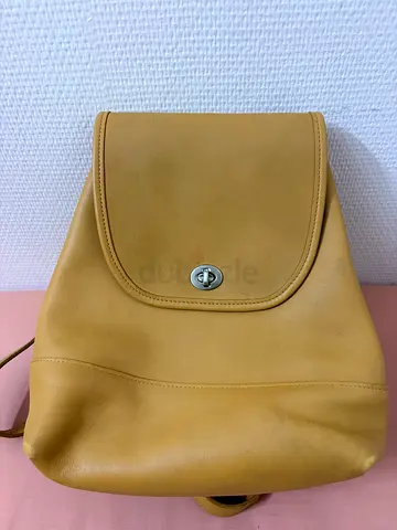 Vintage Coach Yellow Turnlock Backpack - used but good