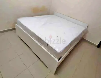 Ikea king size askovol bed frame and Ikea mattress is available