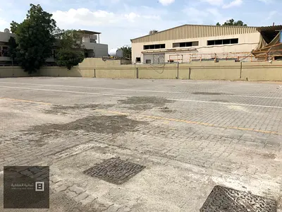 Land in the industrial area on a main street for rent