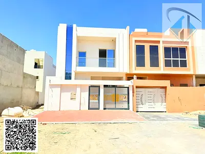 Villa at an attractive price, European design, on a main street, large exterior setback, super deluxe finishing, prime location opposite Al Safir Mall