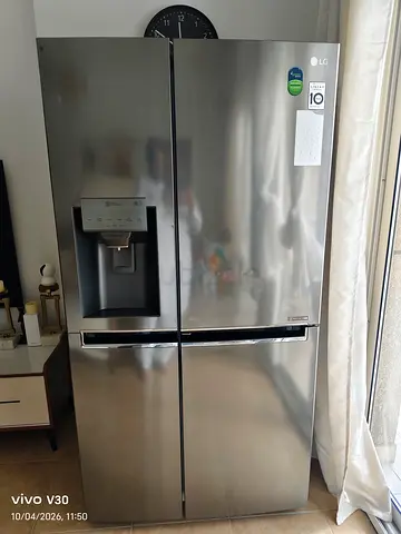 Free delivery side by side refrigerator with water dispenser/ice dispenser - used, good condition