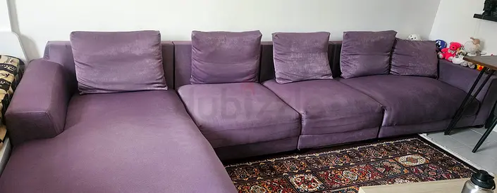 Large purple L-shaped sectional sofa with chaise — used, good condition