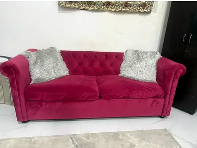Stylish Pink Couch with Plush Cushions