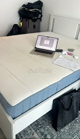 White wooden bed frame with mattress, used - good condition