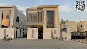 A villa with personal finishes, including registration and ownership fees, located on a main street,