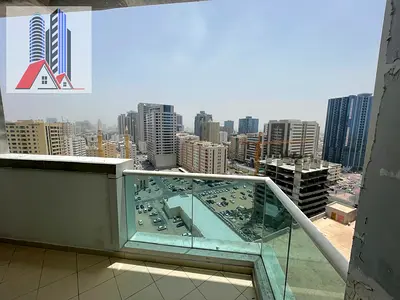 “For Sale: 2-Bedroom Empty Flat in Ajman One Tower – Closed Kitchen, Parking, and Open View”