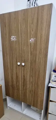 Two-door wardrobe/armoire with bottom cubbies - used, good condition