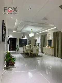 Furnished 5BR villa in Al Rawda 2, prime location near Sheikh Ammar Rd, spacious layout, parking, cl