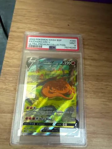 PSA-graded slabbed holographic Pokémon card (collectors item)