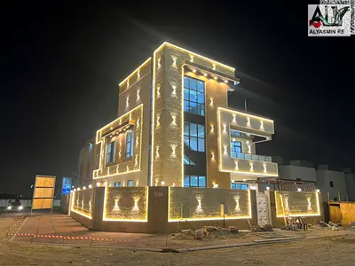 Luxury villa for sale in Al Helio 2, Ajman. Electricity and water included. Prime location directly on the main road and close to all amenities.