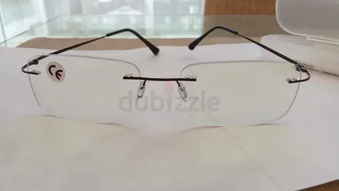 Lightweight rimless glasses with box
