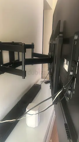 LED flat-screen TV with stand and soundbar