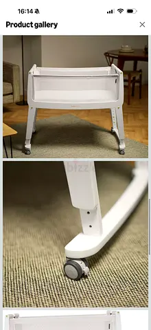 Snuzpod brand, White bedside bassinet on wheels - very good condition.