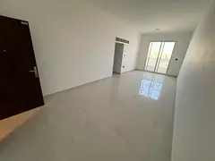 2bhk for annual rent in Al Rawda 3 Ajman inside a new building first occupancy -three bathrooms - tw