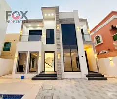Luxury villa for annual rent in Al Rawda 2 Ajman, prime lively location near all services, modern de