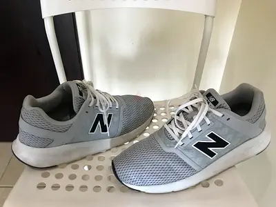 Used New Balance grey running sneakers - lightly worn