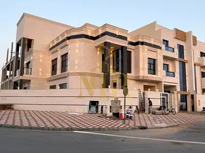 فيلا فاخرة للبيع في الحليو 2 - تصميم أنيق يضم 7غرف نوم واسعة وتشطيبات فائقة الفخامة في موقع استراتيجي في عجمان 🏡✨