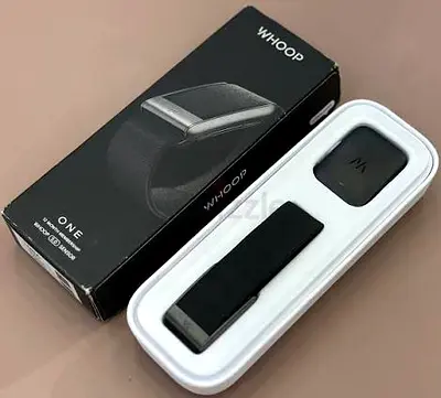Whoop health tracker band with box