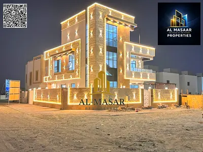 Luxury villa for sale in Al Helio 2, Ajman. Includes electricity and water. Prime location directly on the main road and close to all amenities.