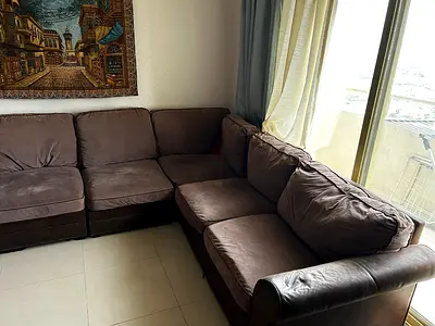 Brown L-shaped sectional sofa - used, good condition
