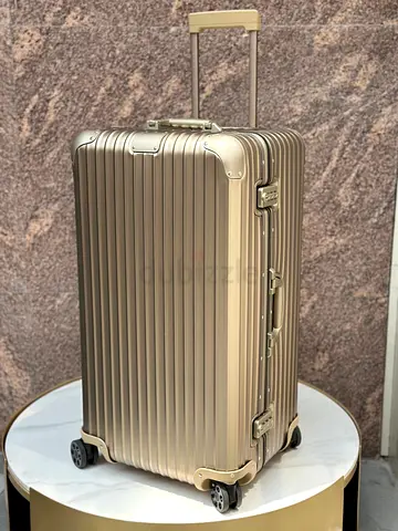 Rimowa  Check-In L suitcase in titanium, a durable aluminum luggage