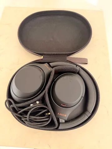 My Sony WH-1000xm4 noise-cancelling over-ear headphones with case and cable