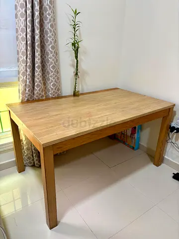 My wooden dining table - sturdy, good condition