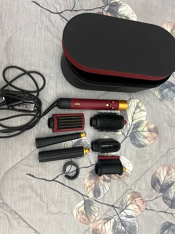 Hot-air hair styler set with multiple attachments
