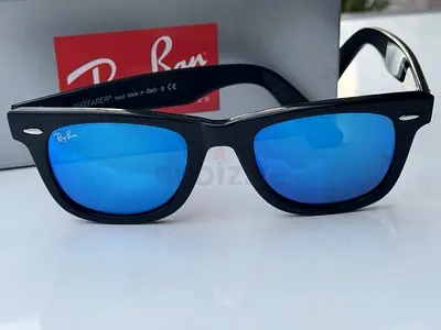 Ray-Ban Wayfarer sunglasses — black frame with blue mirrored lenses