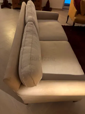 Im selling my beige Crate  Barrel 3-seater sofa - it’s well used but otherwise in good condition