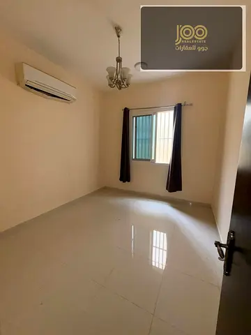 For rent Al Mowaihat 1, 1BR hall, spacious, residential building, prime location near Sheikh Ammar Rd. AED 30,000, deposit 2000, 4 payments.