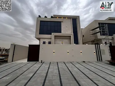 Modern villa for sale in Al Helio - Ajman | 5 master bedrooms, central air conditioning, registration fees included |